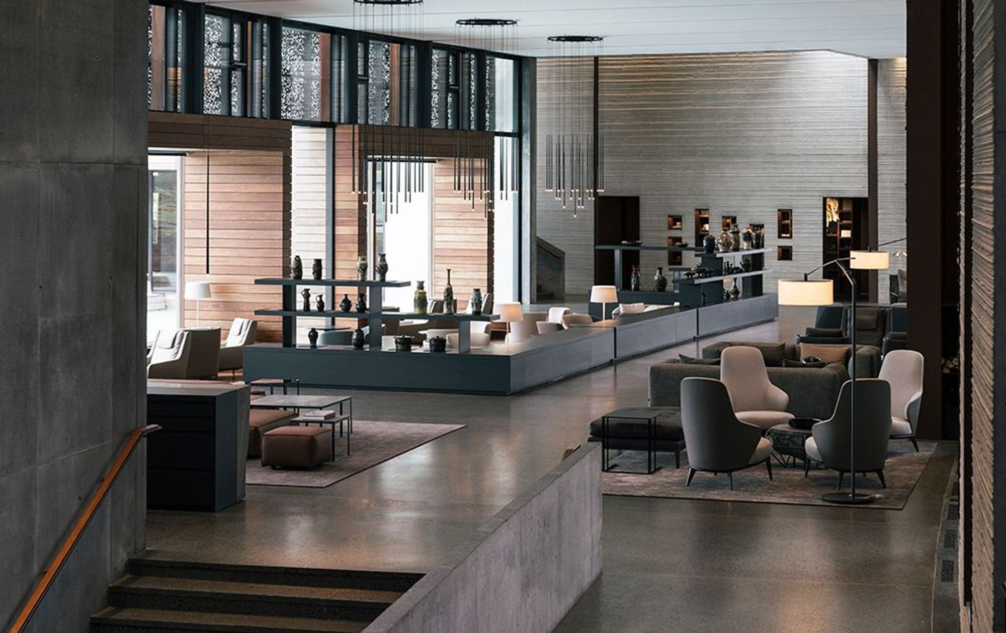 A modern interior space, possibly a hotel lounge with modern furniture