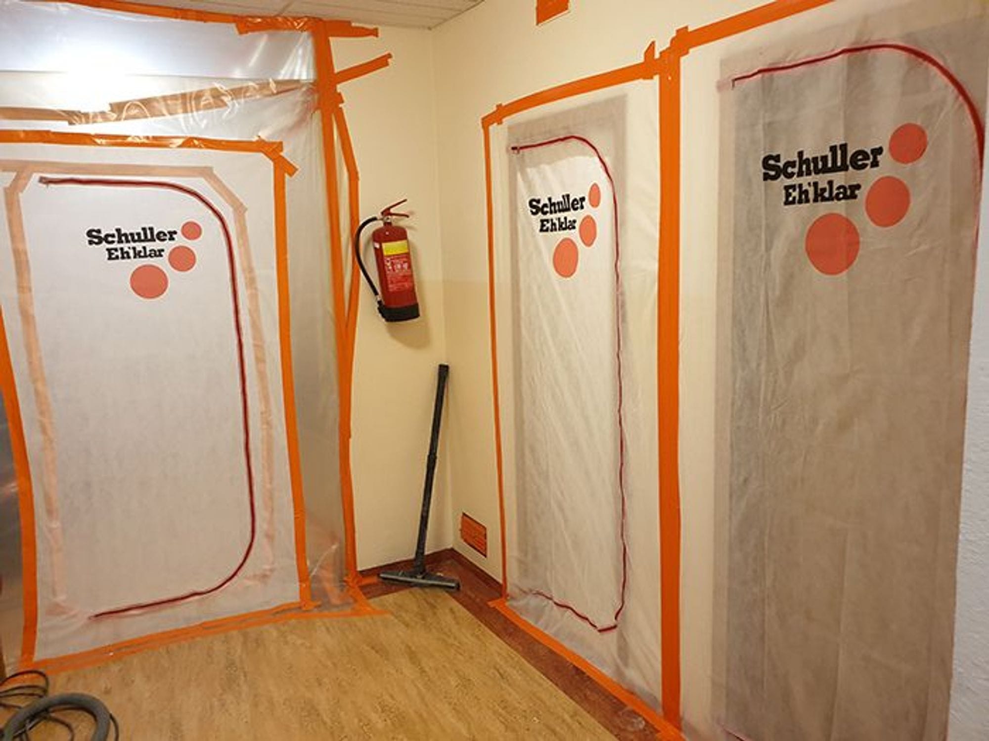 a construction area cordoned off with orange safety barrier 
