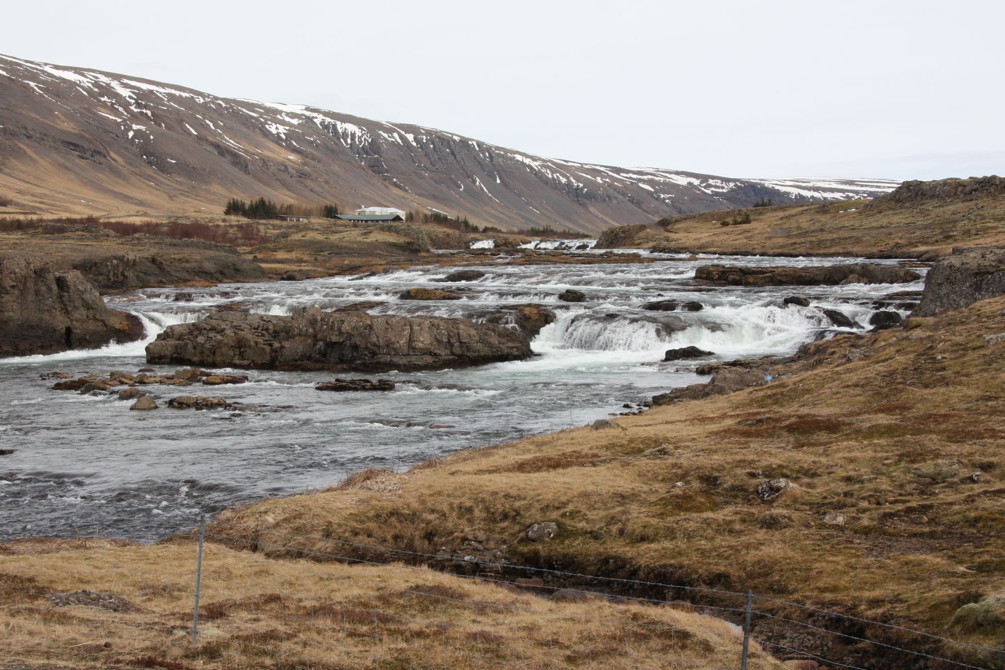 rugged landscape featuring river and mountainous river