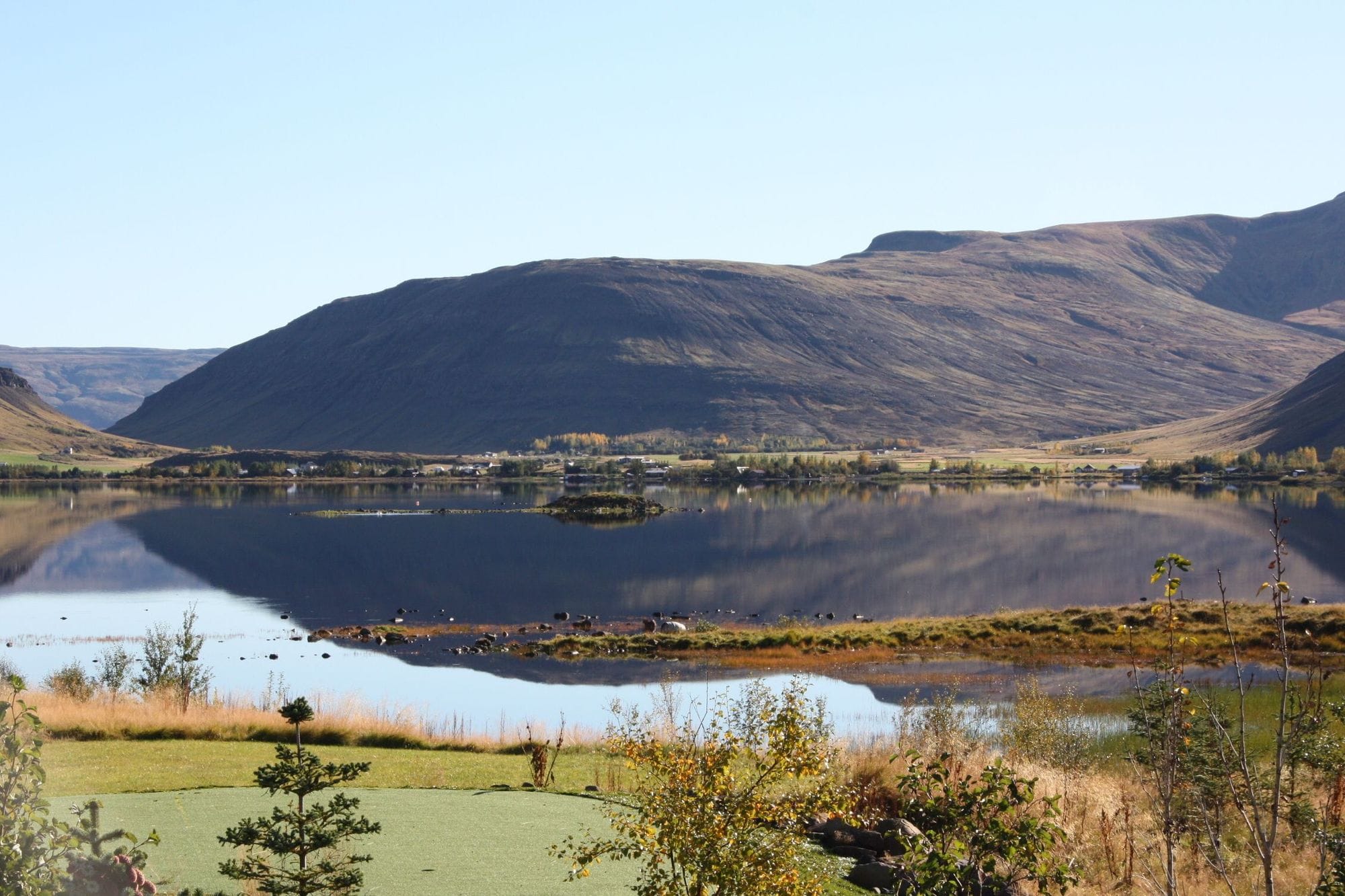 serene lake surrounded by mountain 