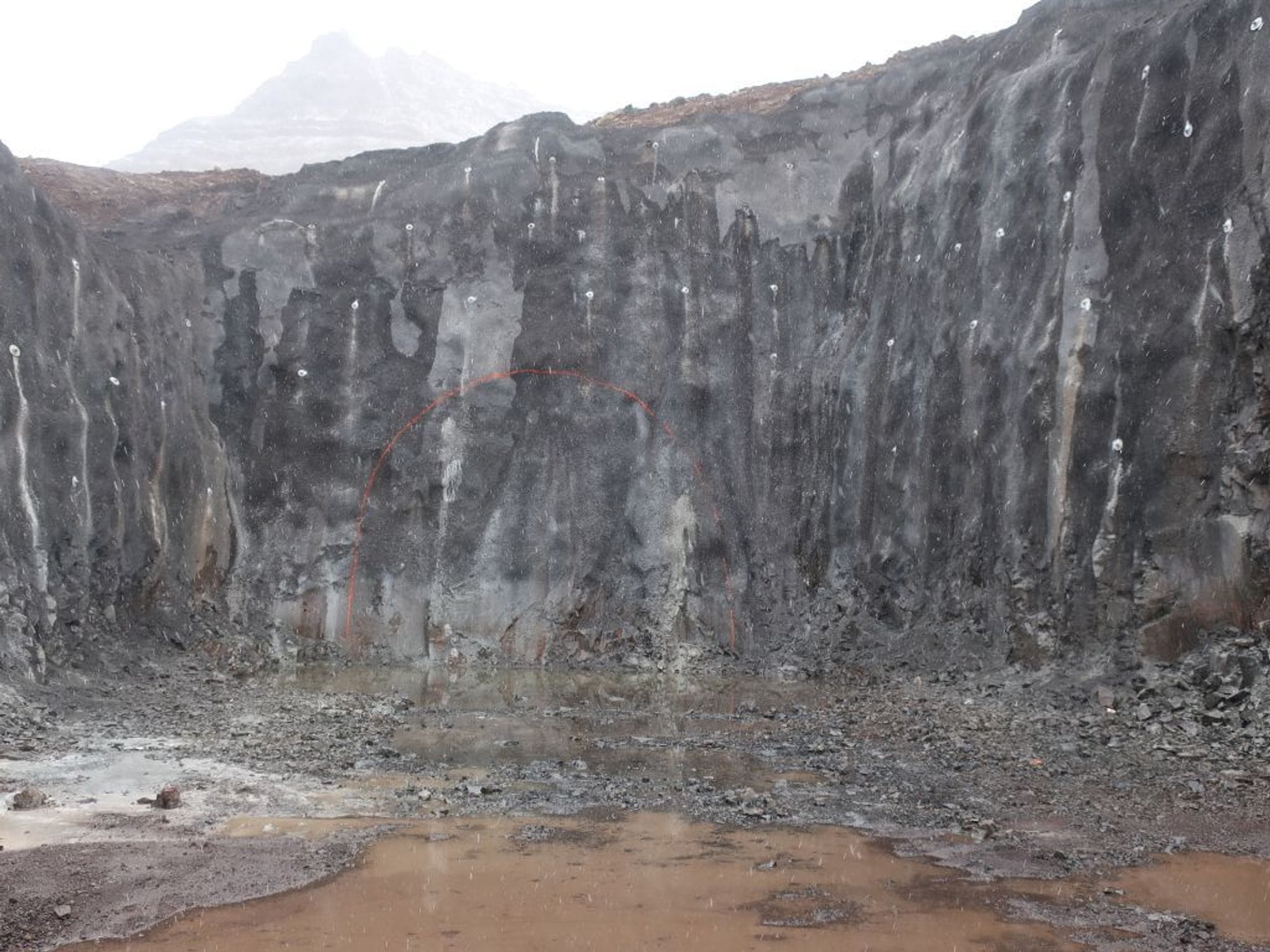 A rocky cliff face with different texture