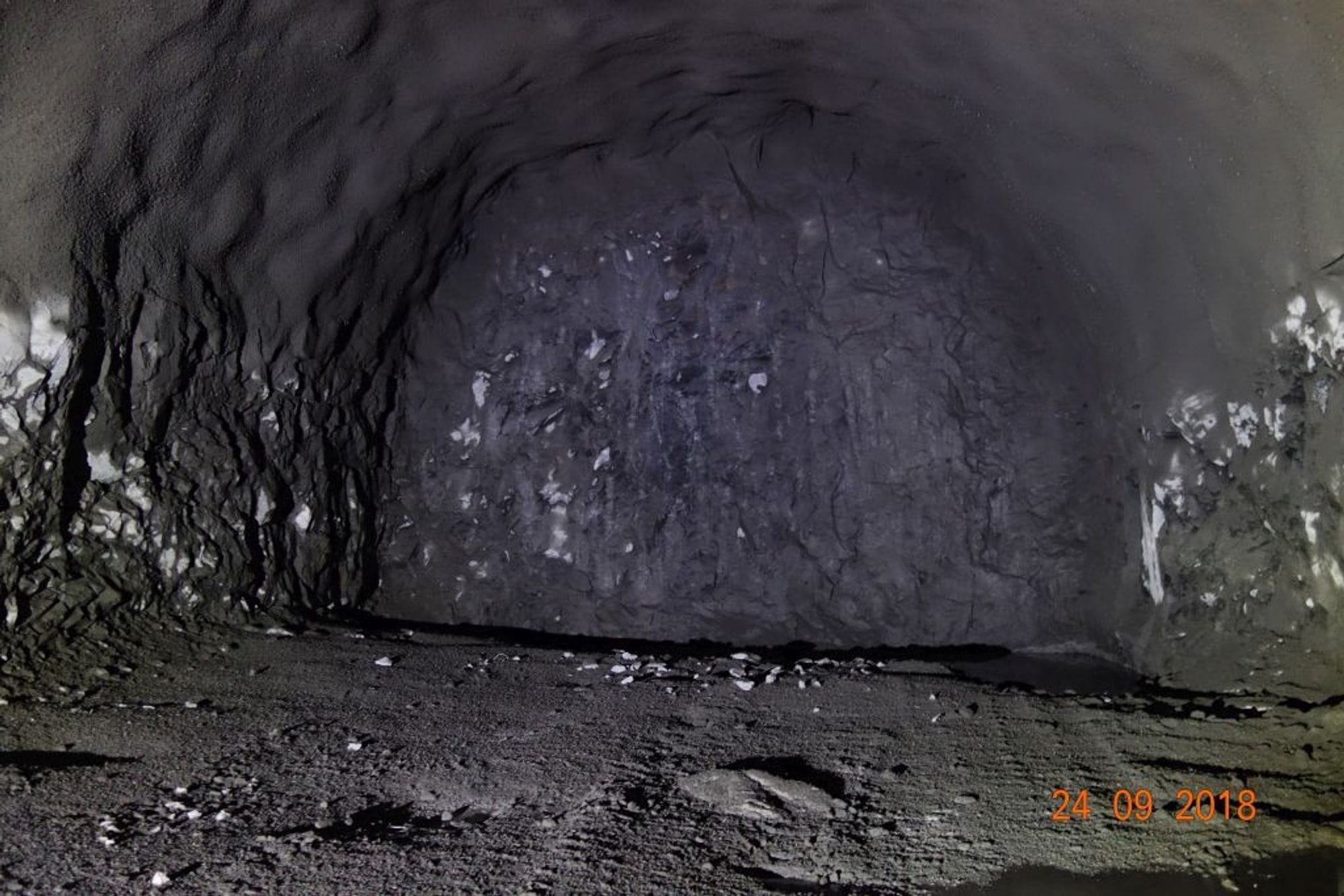 A dark tunnel or cave interior