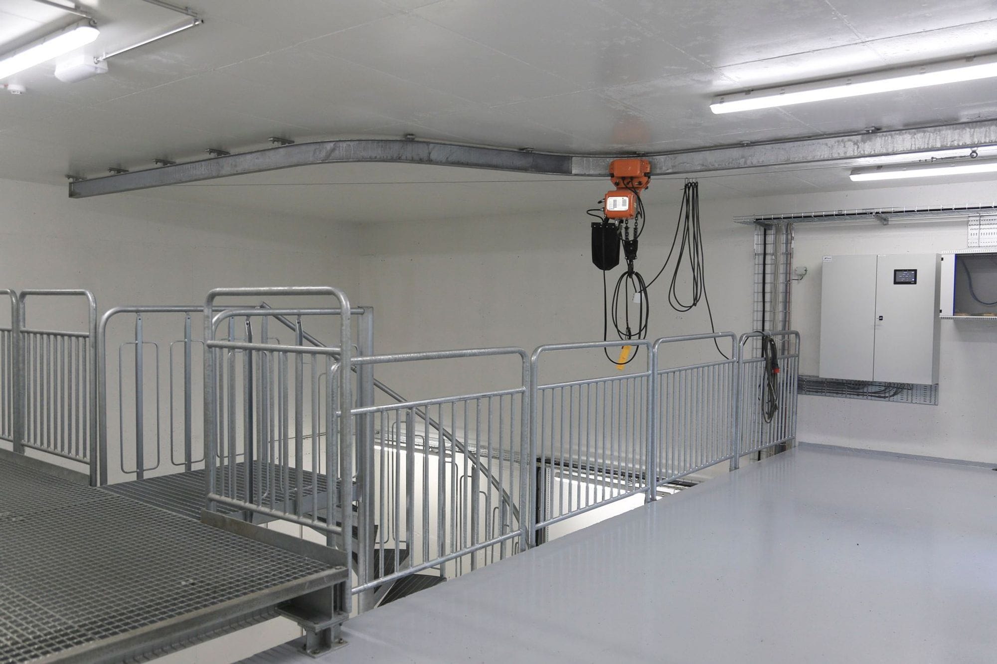 A clean and well-lit space with metal railings