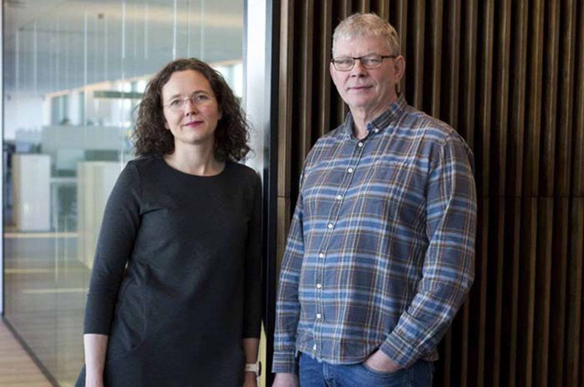 A woman and a man standing next to each other