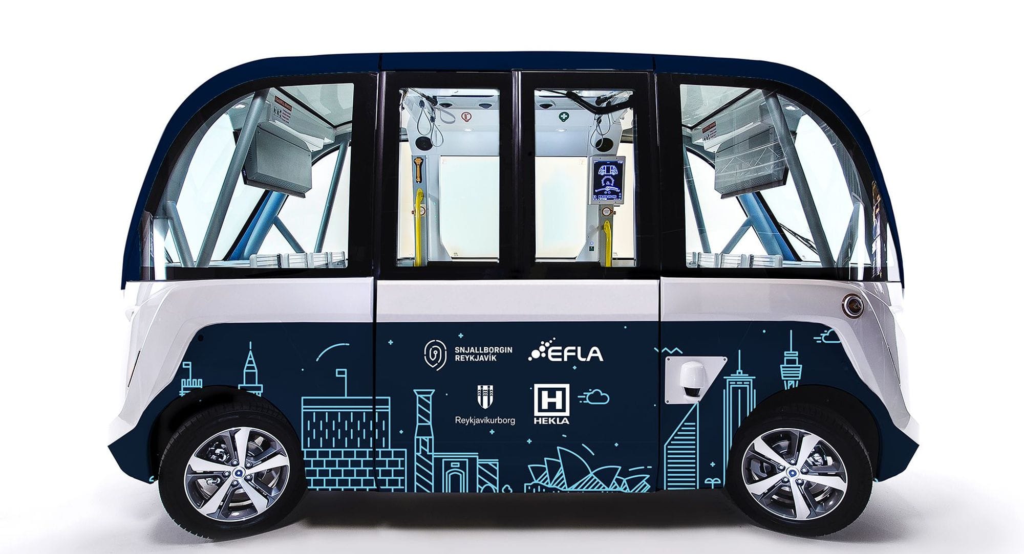A vehicle which appears to be a bus with a detailed illustration of buildings on it bottom half part