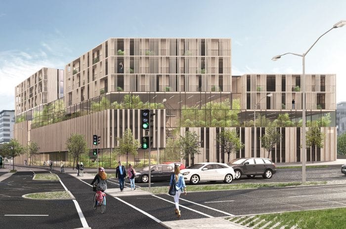 3D model of a multi story building alongside a street with pedestrians and parked car