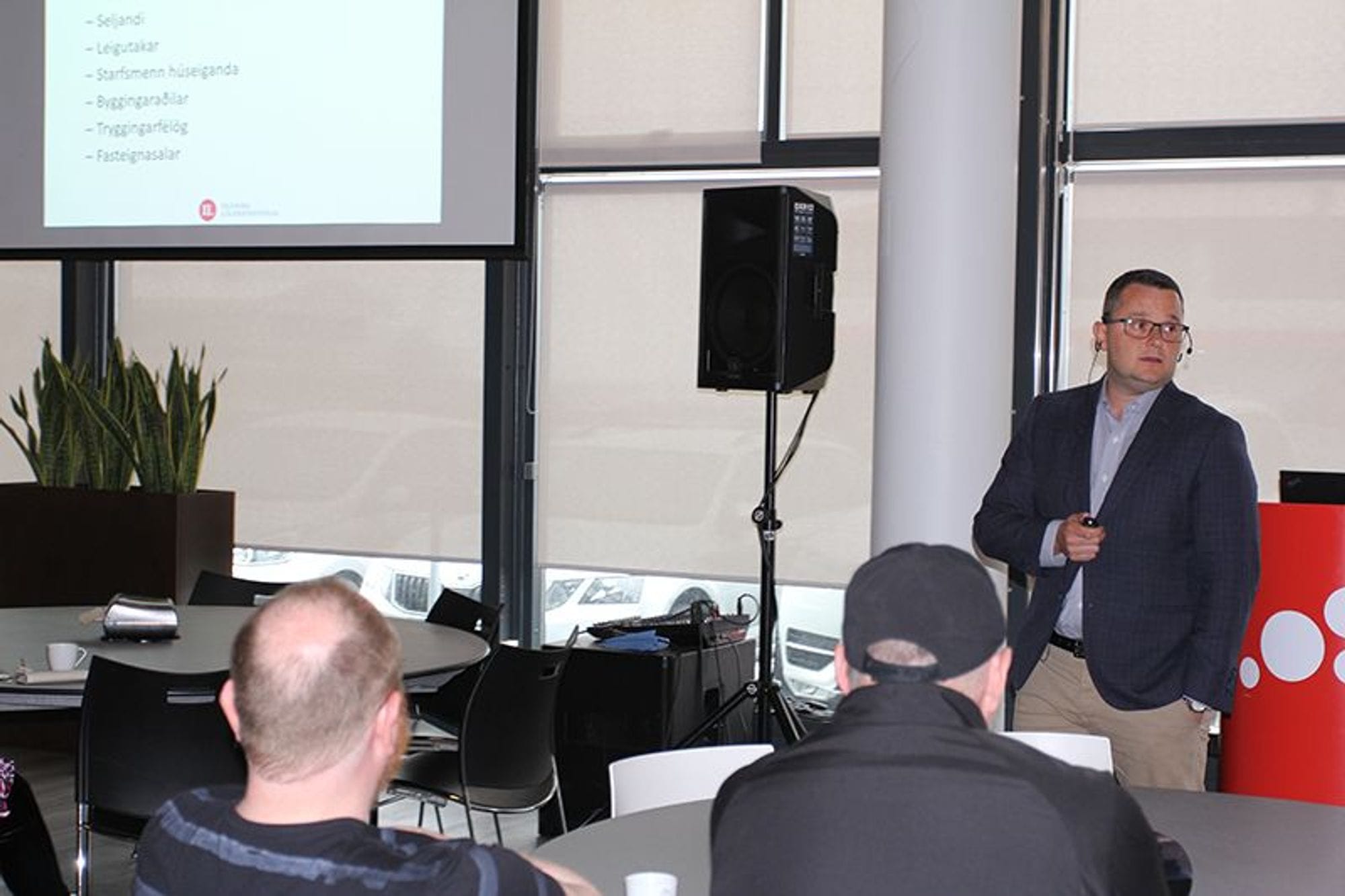 A man giving a lecture to an audience