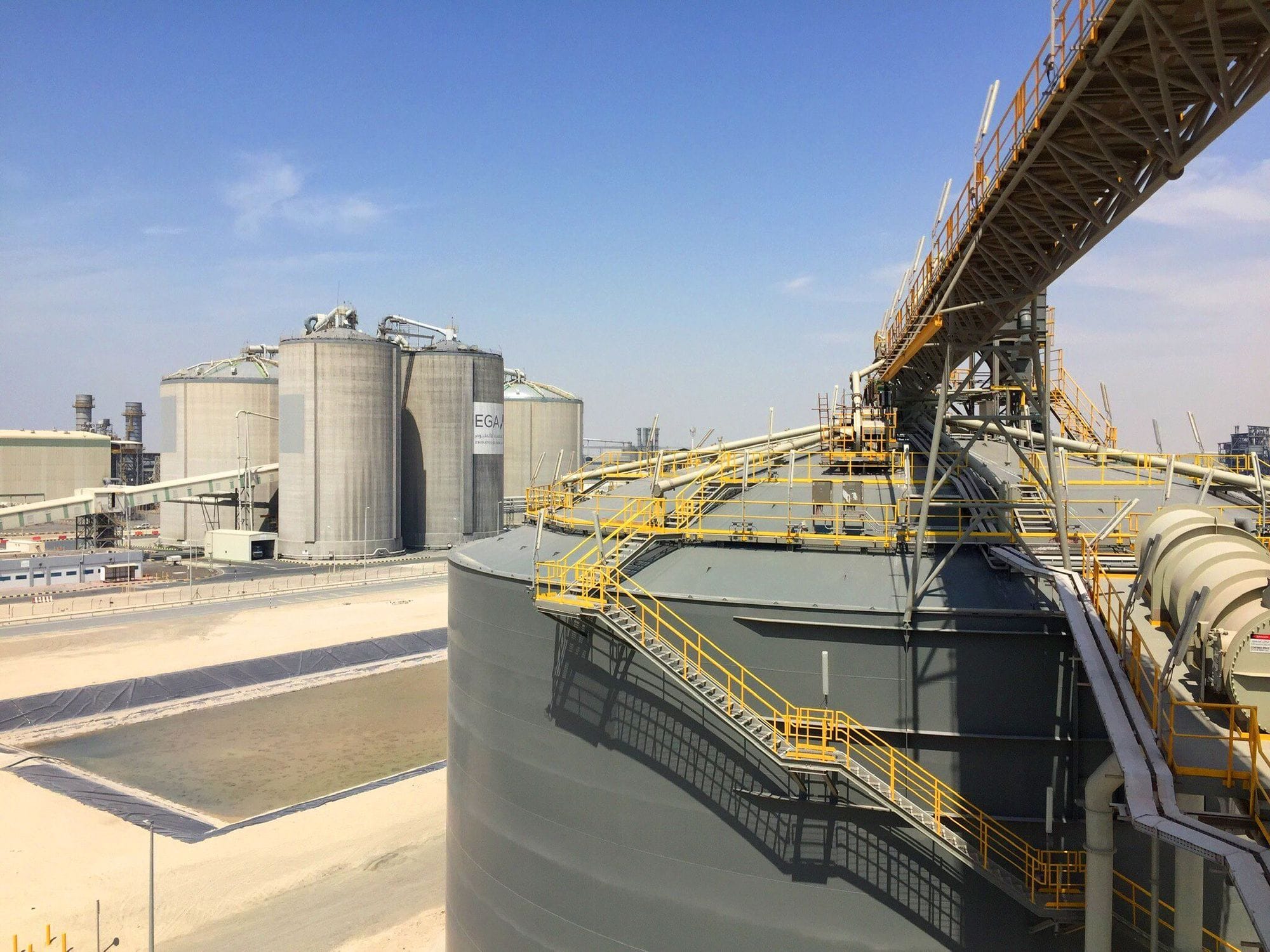 An industrial setting with storage silos