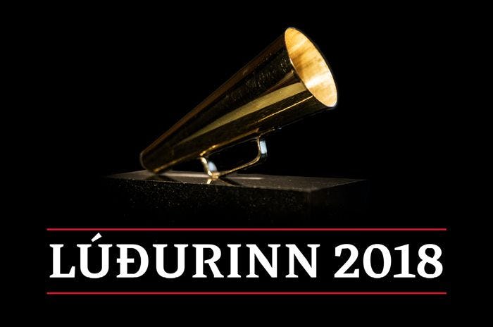 A brass horn with text the text "LUÐURINN 2018"