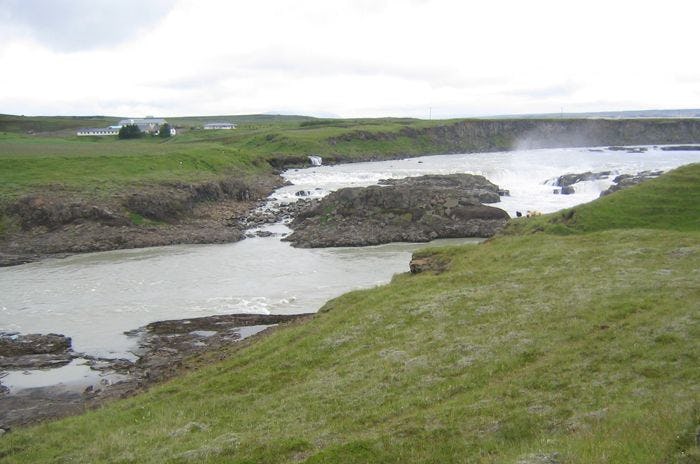 A river with grassy shore