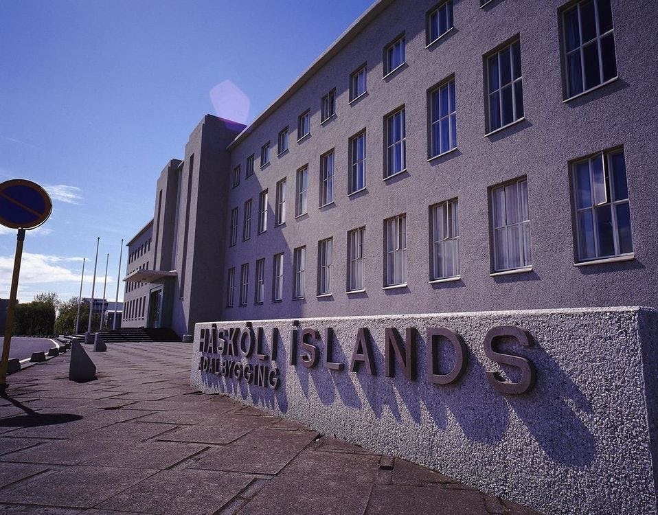 The photo shows an exterior of a building with the sign "Háskóli Íslands"