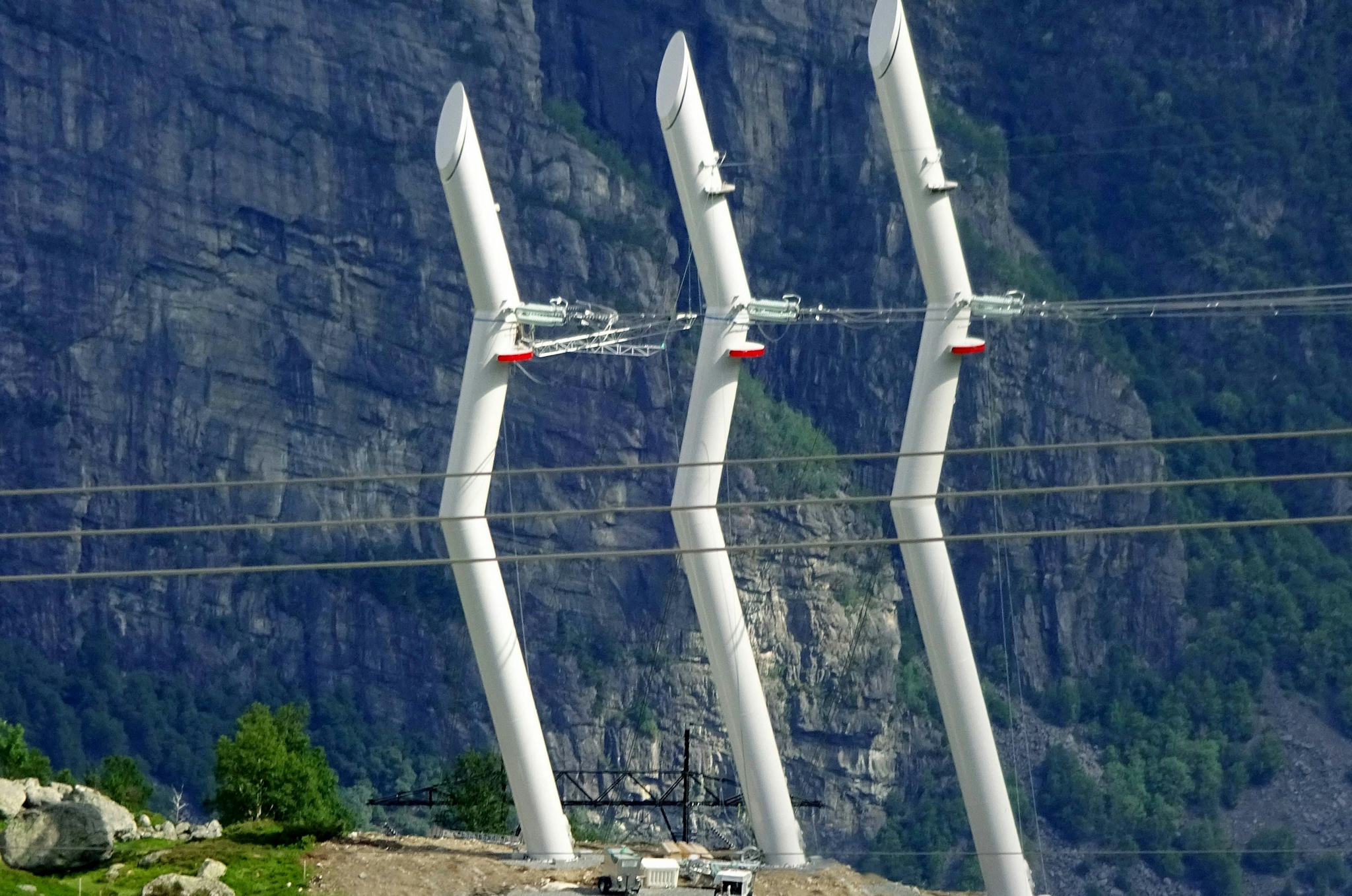 Three white transmission towers