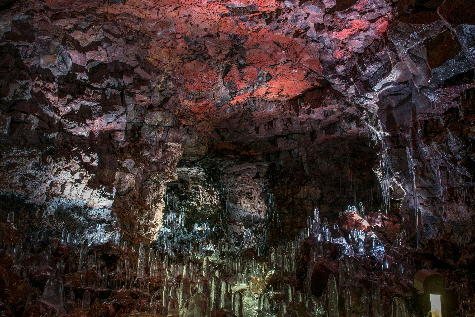 bright illuminated cave interior with red tone