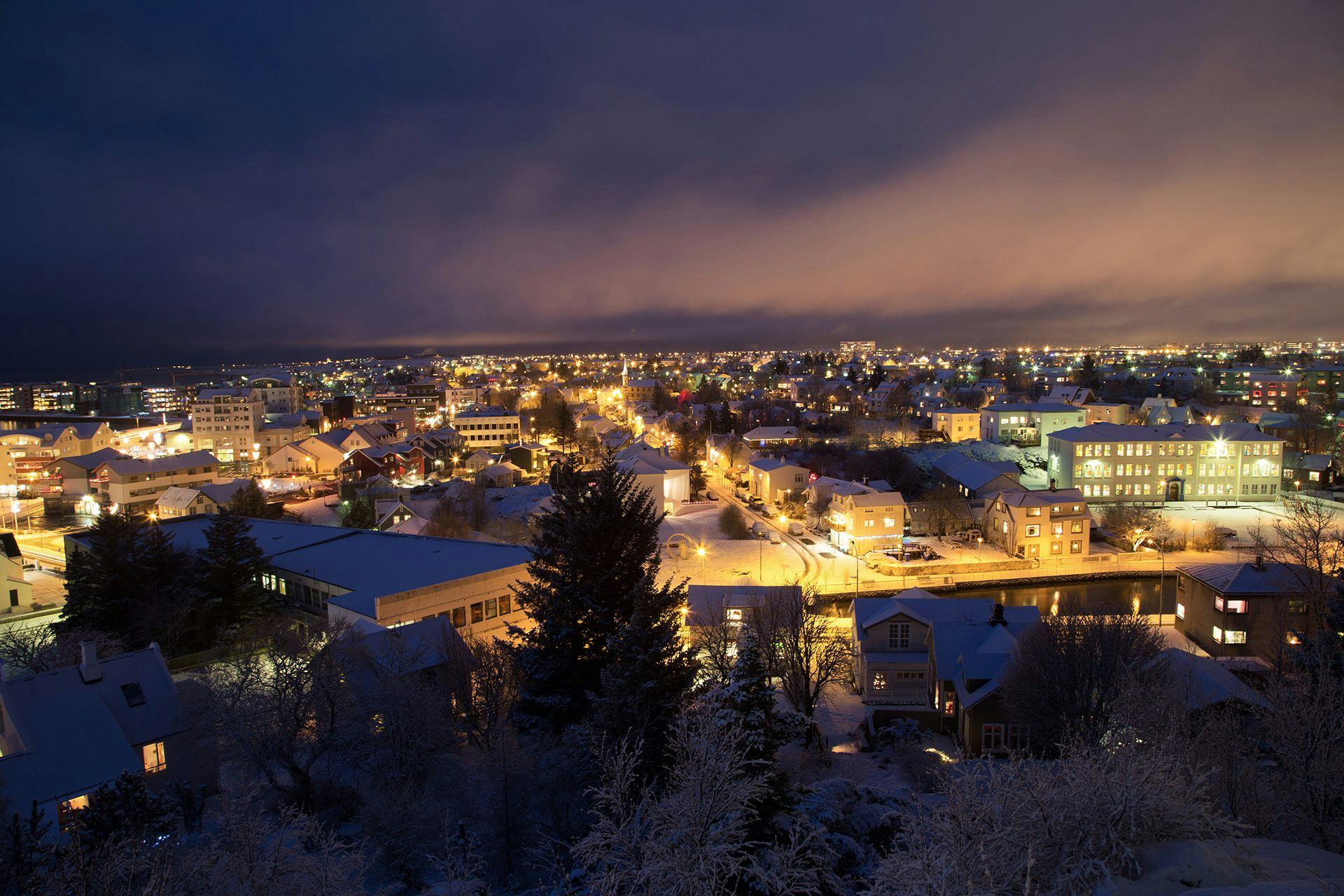 Nighttime view of snow covered town